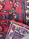 Handwoven 1920s Persian mini rug showcasing close-up wool pile texture and back weave.