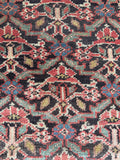 Antique Persian Bakhtiari runner, collectible hand knotted vintage wool rug with an allover lattice design, mellow vegetable dyed colors, and soulful handmade craftsmanship.