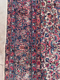1920 Persian Kerman carpet showing the detailed border work.