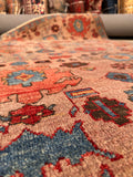 Close-up view of stiff-handle Heriz rug with vegetable dyed wool fibers. 