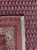 Underside view of small antique Persian Malayer rug with handwoven vegetable dyed wool.