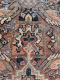 Antique Persian rug  showing worn low pile contrast next to areas of thicker preserved wool.