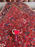 A durable, hand-knotted wool area rug designed for high-traffic spaces.