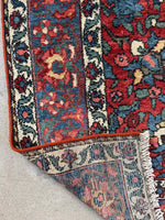 Low pile Bakhtiari rug with natural wool and cotton foundation.