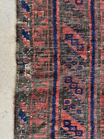 Border view with aged dyes and worn area.