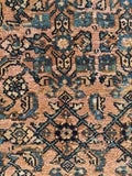 Vintage Bibikabad rug with rich natural dyes and balanced composition.