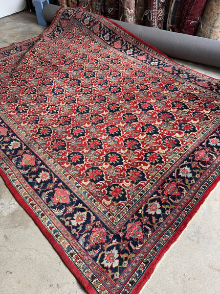 Angled shot highlighting the beauty of this Bidjar rug.