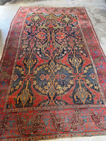 Full view of an antique mid-19th century Persian Bidjar rug.
