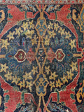 Detail of intricate tribal patterns and aged wool colors.