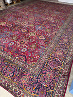 Antique Persian rug from 1920s Tehran with magenta field