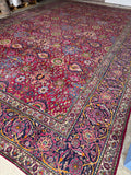 Antique Persian rug from 1920s Tehran with magenta field