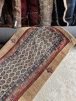 Vegetable-dyed wool details on an antique Seraband runner.