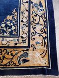 Corner view of large blue antique area rug 14x19 with vegetable dyed wool.