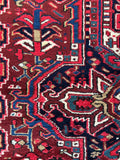 Large antique wool rug. Persian Heriz carpet with contrasting guard borders, teal paisley motifs, and an ivory floral chain border.