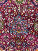Vintage Persian rug with dynamic symmetrical layout