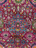 Vintage Persian rug with dynamic symmetrical layout