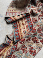 Antique Persian Mahal runner folded showing floppy handle.