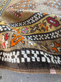 Antique Persian runner with handwoven tribal motifs and sturdy old-world construction.