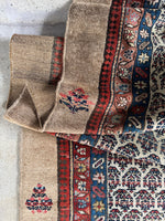 Handwoven Persian Seraband runner showing diagonal boteh motifs.