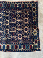 One end view of vibrant dyes and tribal design.