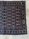One end view of vibrant dyes and tribal design.