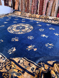 Large blue antique area rug 14x19 with a blue and gold color story.