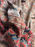 Hand-knotted vegetable-dyed wool runner with a floppy handle, historic wear, and rich soul.