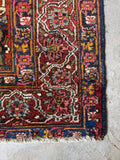 Vintage Persian Bakhtiari area rug with vegetable dyed wool, geometric floral pattern and natural sheen.