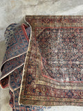 Large antique Persian gallery rug. Vintage Ferahan wool rug with a navy field, densely packed Herati pattern, and beautifully aged vegetable dyes.