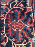 Antique Heriz area rug. Hand knotted Persian carpet with striking ombré medallion, geometric border, and sturdy full wool pile.