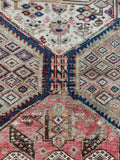Subdued compound-washed Persian runner with earthy and blush tones.
