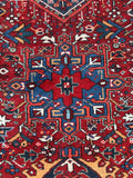 Long antique Persian rug. Hand knotted Heriz gallery rug with geometric tribal motifs, colorful medallions, and a bold architectural layout.