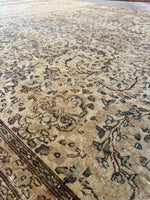 Designer-favorite subdued tones in antique Persian rug.
