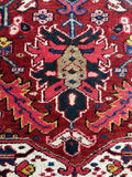 Close up view of floor-ready antique Persian Heriz rug with excellent condition and durable wool.