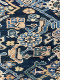 Close-up of Herati design on midnight blue background.