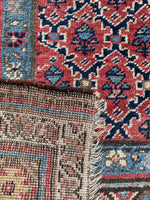Underside view of Persian Bidjar rug with strong construction and intricate artistry.