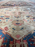 Handwoven Persian runner with original tribal motifs and feminine details.