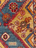 Rare yellow field antique Persian rug demonstrating earned wear and historic natural dye abrash.