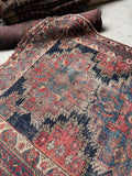 5x6 navy blue Persian Afshar rug with three medallion design and tribal border details.
