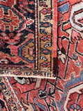 Rustic mountain tribal Persian rug overhead view highlighting heavy wool construction made for family homes and pet-friendly spaces.