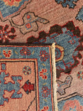 Underside view of heavy double-knotted Persian rug with dense wool pile.