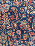 Stout and heavy antique Persian rug with authentic time-earned character.