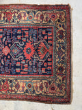 Wool Kurdish rug with traditional Persian design.