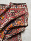 Another corner shot showing off texture and aged dyes.