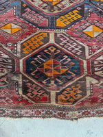 Up close view of turmeric yellow details woven into the field.