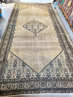 Handwoven Ferahan rug featuring a poled central medallion