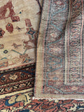 Underside view of an antique hand-knotted wool rug in 13'2 x 20'3 providing old-world interior decor inspiration.