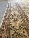 Side view of rug showing lightened hues and subtle contrast.