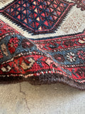 Wool pile detail on early 1900s Persian runner.