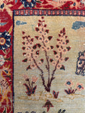 1900s vegetable dyed Tabriz rug close-up highlighting natural dye tones, fine wool texture, and authentic antique patina.